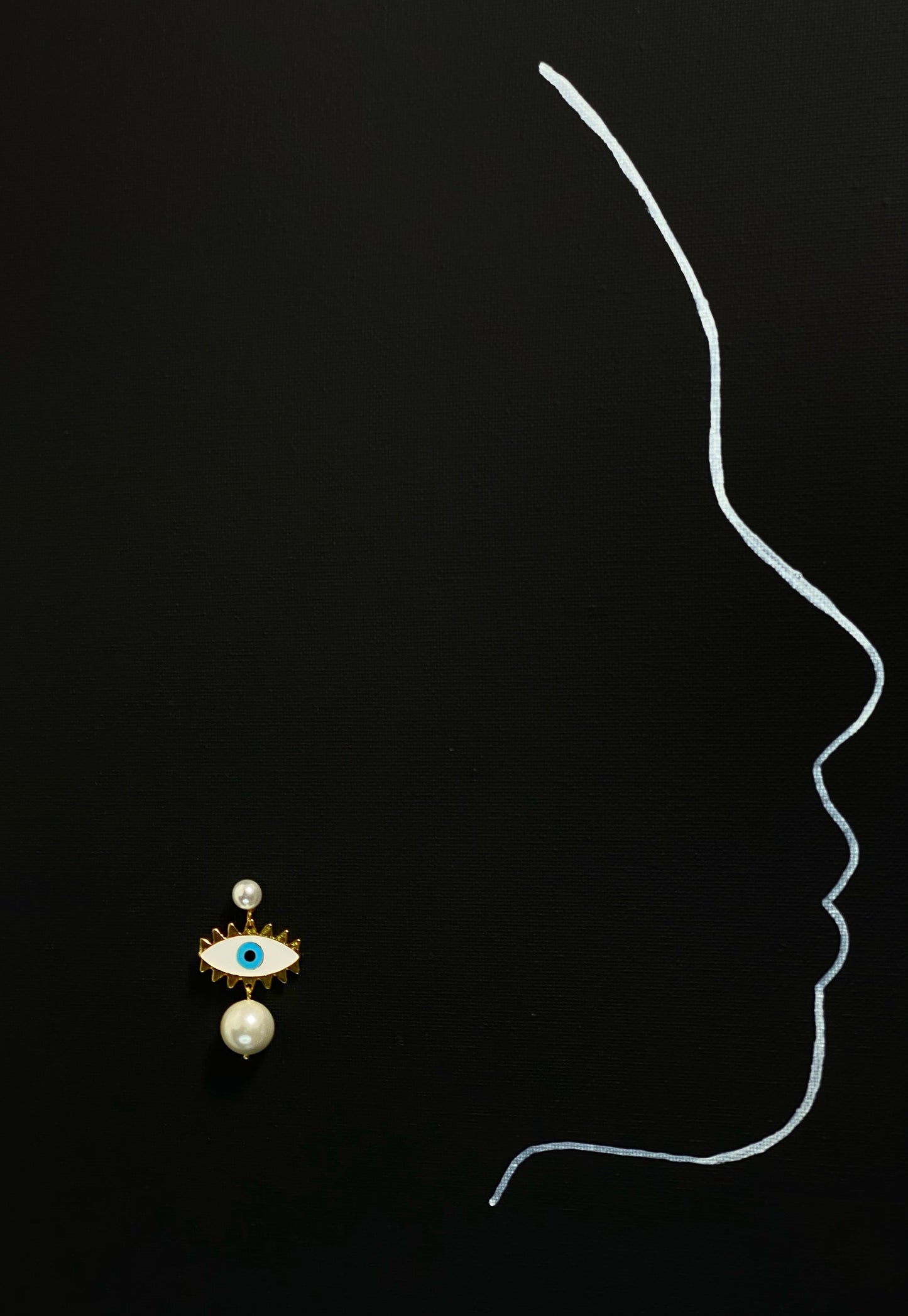 White "Angel Eye" Pearl Earrings