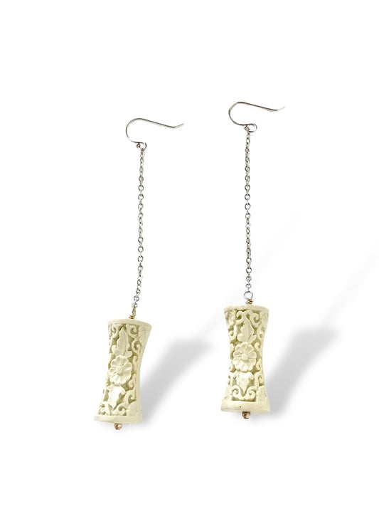 Carved White Resin and Silver Dangle Earrings